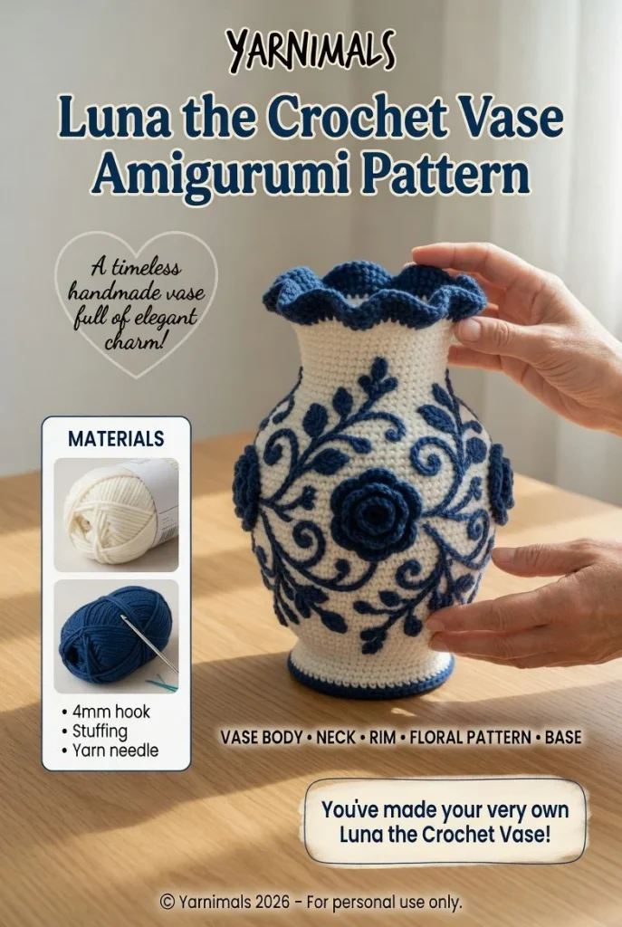 Vintage crochet vase with floral motifs in off-white and navy blue, featuring a ruffled top.